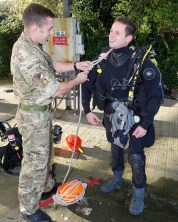 Surg Lt Jamie Vassallo being prepared for army diving session