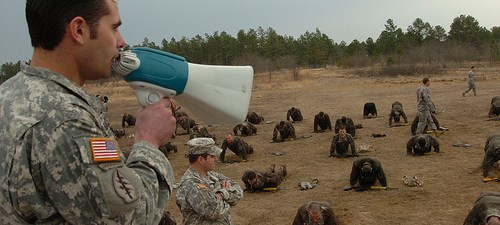 Staff on the US Army's 'Q' course providing some feedback and encouragement to candidates.